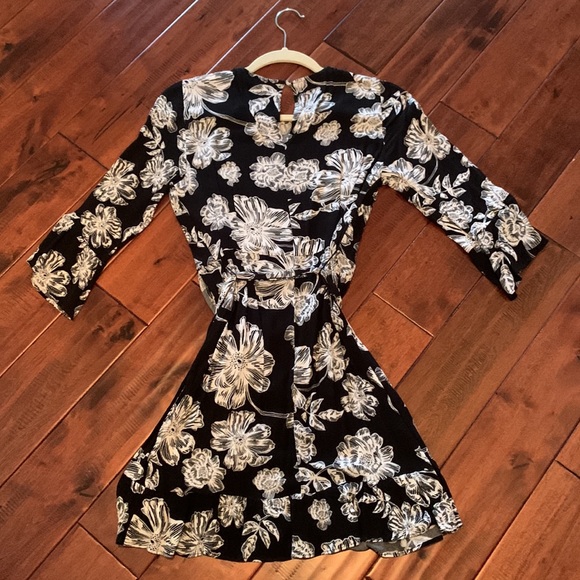 Black and white floral, wrap dress with ruffle detail. - Picture 8 of 9